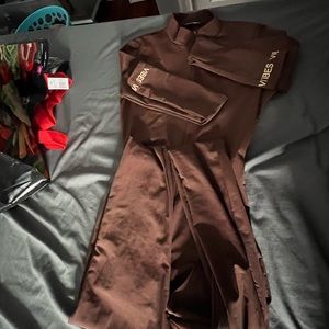 brown with words jumpsuit